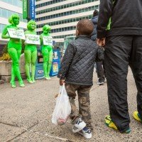 PETA models don body paint at City Hall to spread 'Go Vegan' message